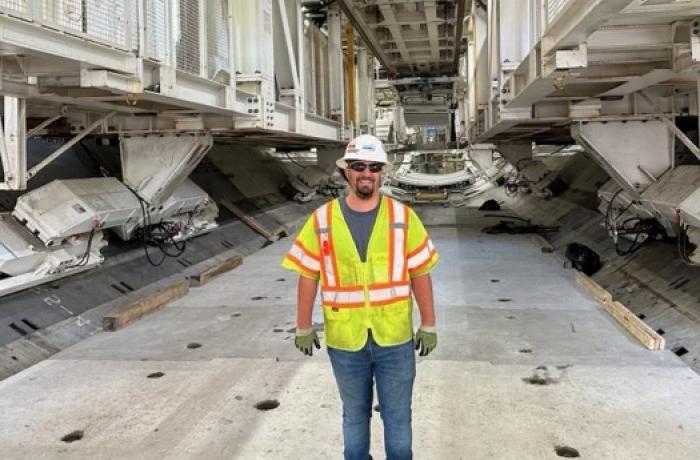 engineering major stands in front of HRBT project